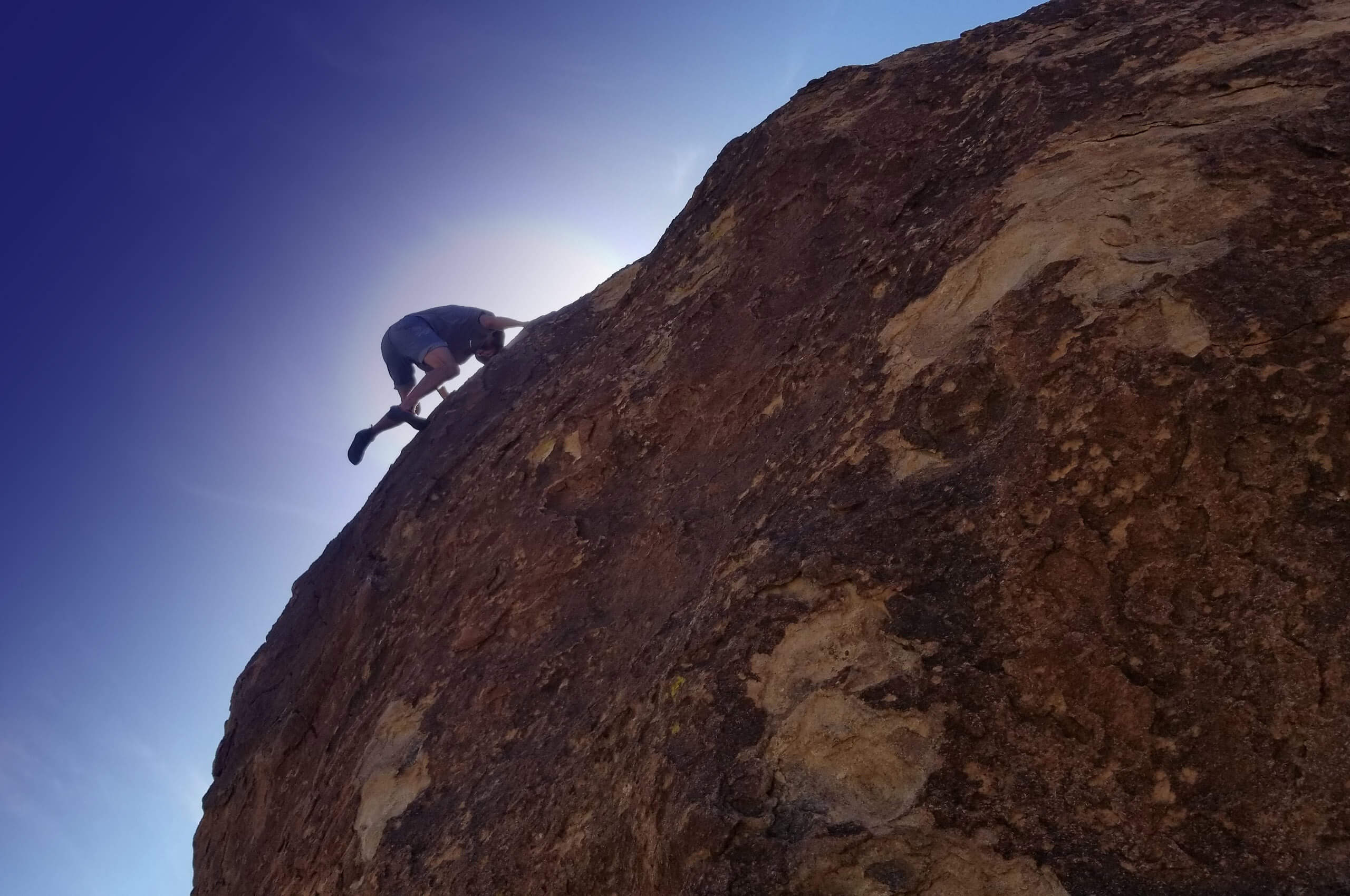 Person-climbing-a-rock